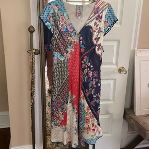 Johnny was silk dress.  Large.  worn once and looks now.